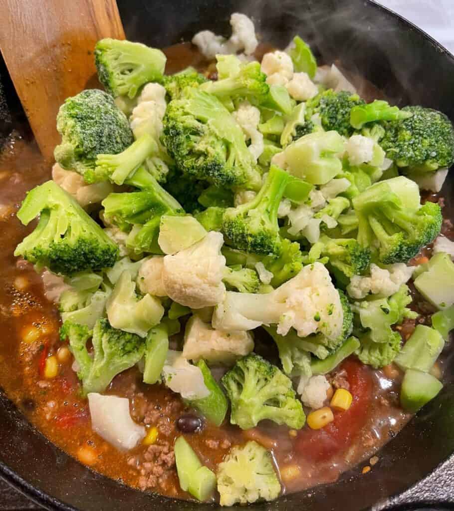 frozen broccoli and cauliflower on top of the taco soup