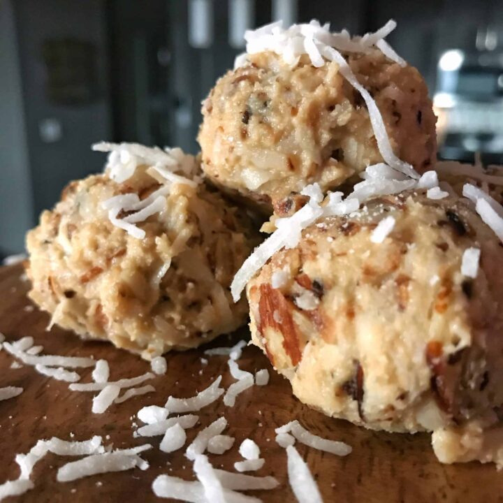 Quick and easy toasted almond and coconut no bake protein bites with 8 grams of protein and only 97 calories per bite. These make for the perfect snack on the go or sweet tooth or cravings fix.