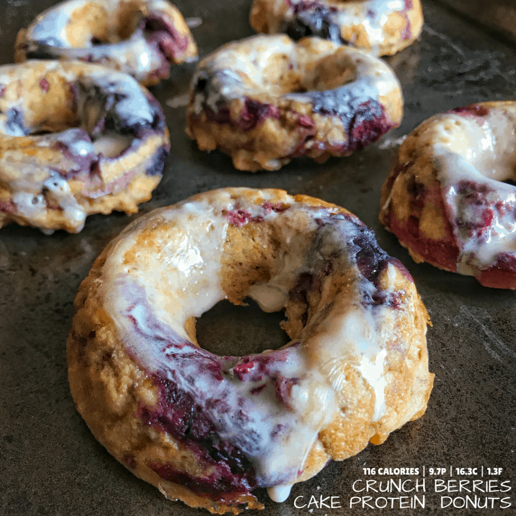 A protein donuts recipe made with Cap'n Crunch, real berries, and a healthier powdered sugar-based cereal milk donut glaze. With only 116 calories and nearly 10 grams of protein per donut, you may have found your new breakfast staple.