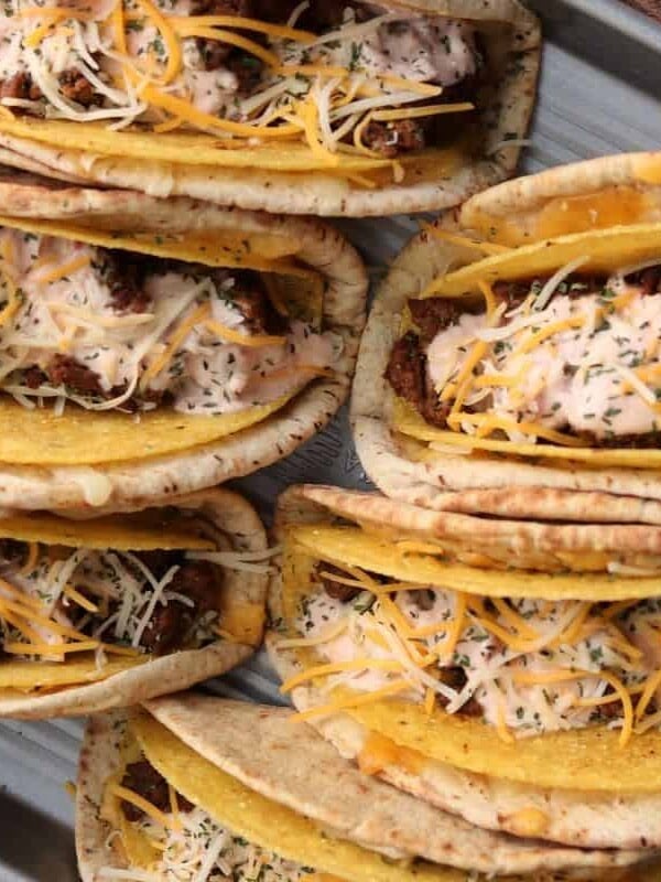 copycat cheesy gordita crunches on a baking sheet