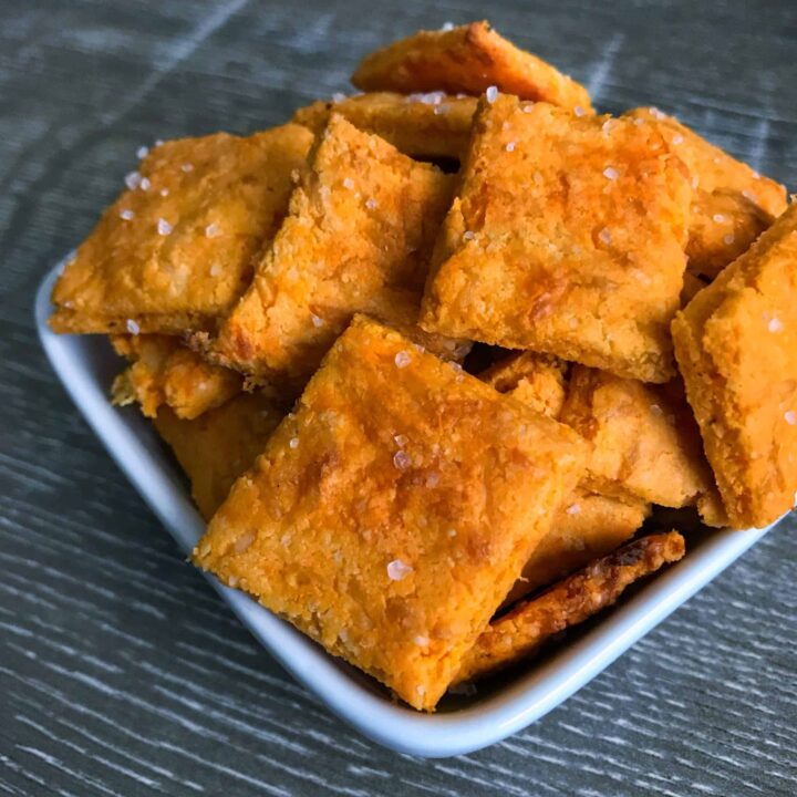A quick and easy low carb Cheez-It copycat that keeps both calories and carbs low without sacrificing the cheesy flavor and cracker texture. If you're looking for an extra cheesy low carb snack, look no further.