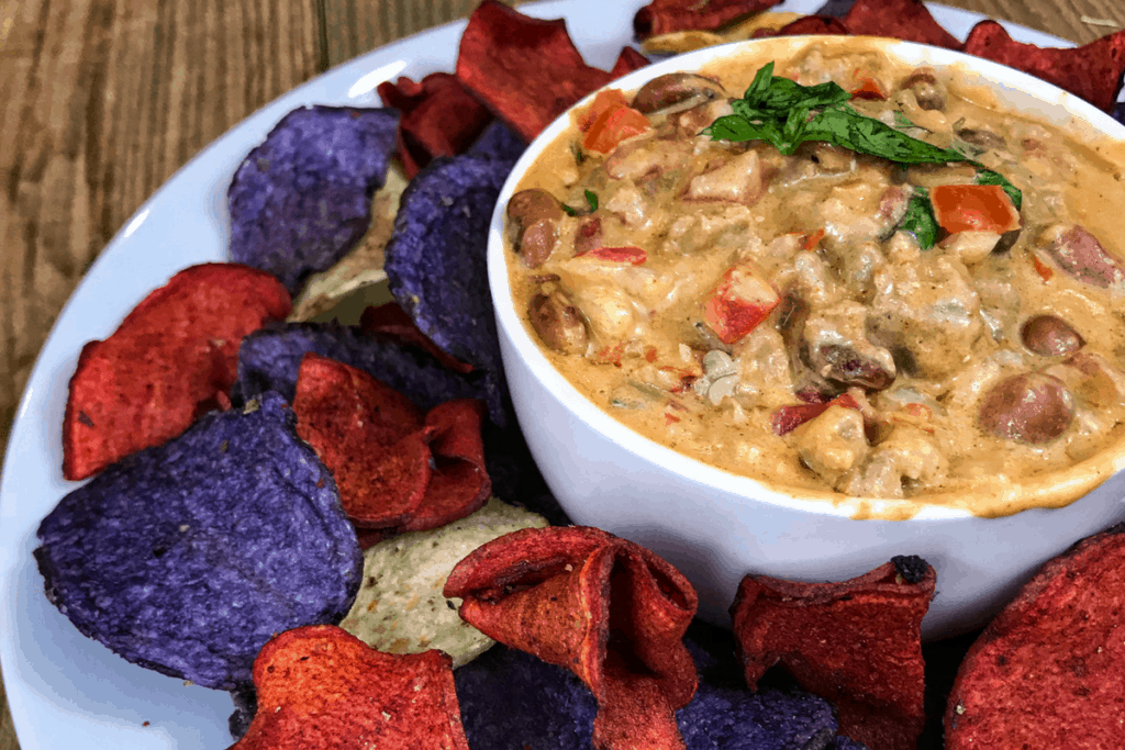 In less than 15 minutes, you'll have a high protein cheese dip perfect for nachos, topping burritos and tacos, or simply dipping. Each serving has 15 grams of protein and only 140 calories. You'll also find a quick and easy low calorie tortilla chip recipe.