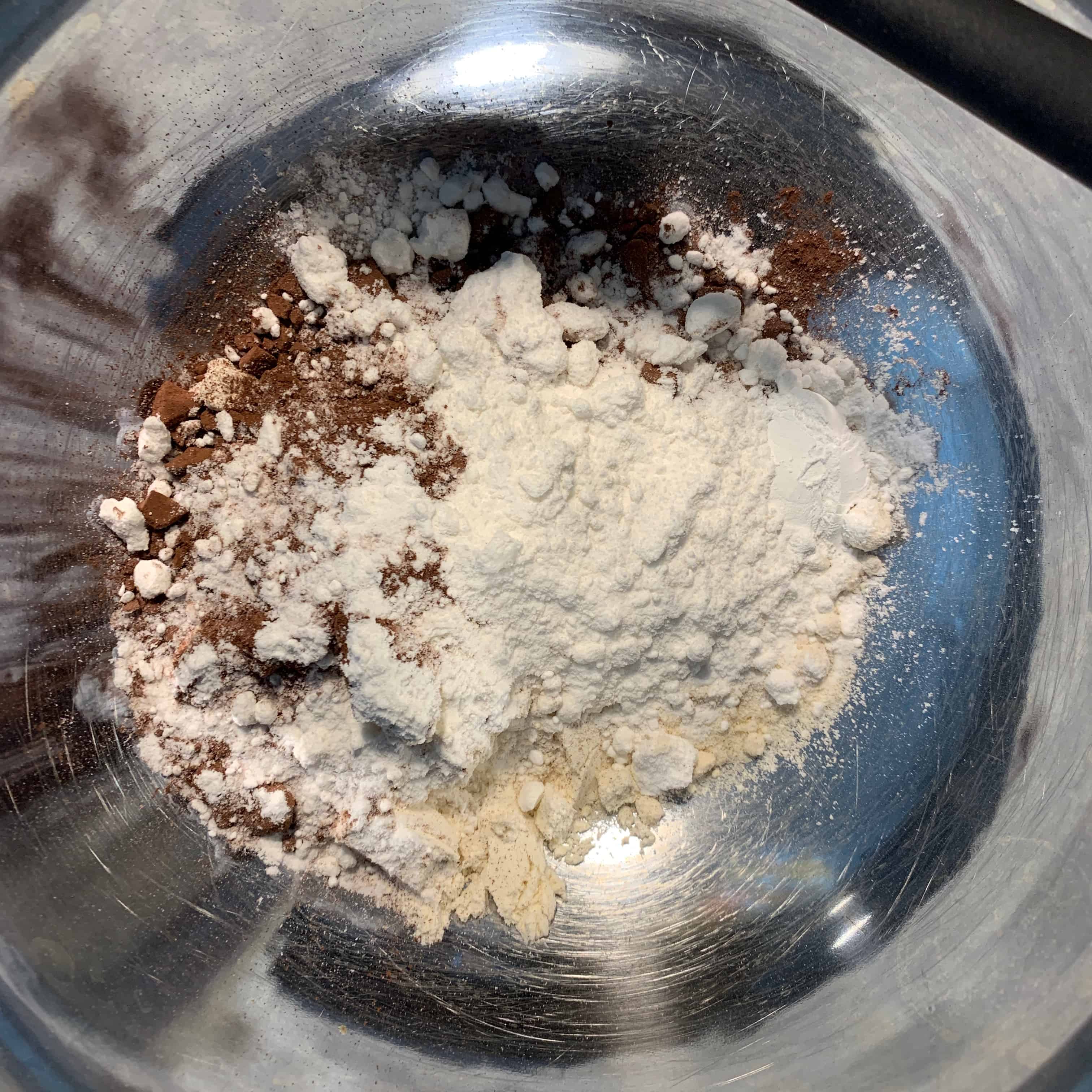dry ingredients for protein cookies in a mixing bowl