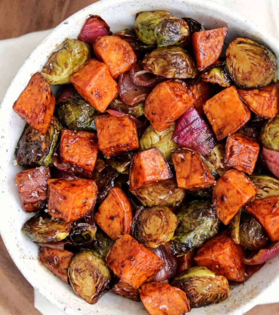 balsamic bbq roasted brussels sprouts and sweet potatoes in a bowl