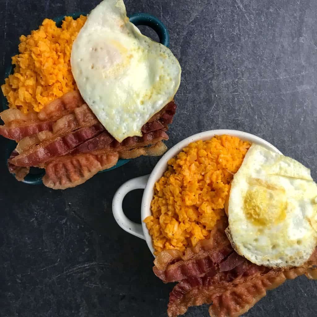 low carb cheddar cauliflower grits with eggs and bacon
