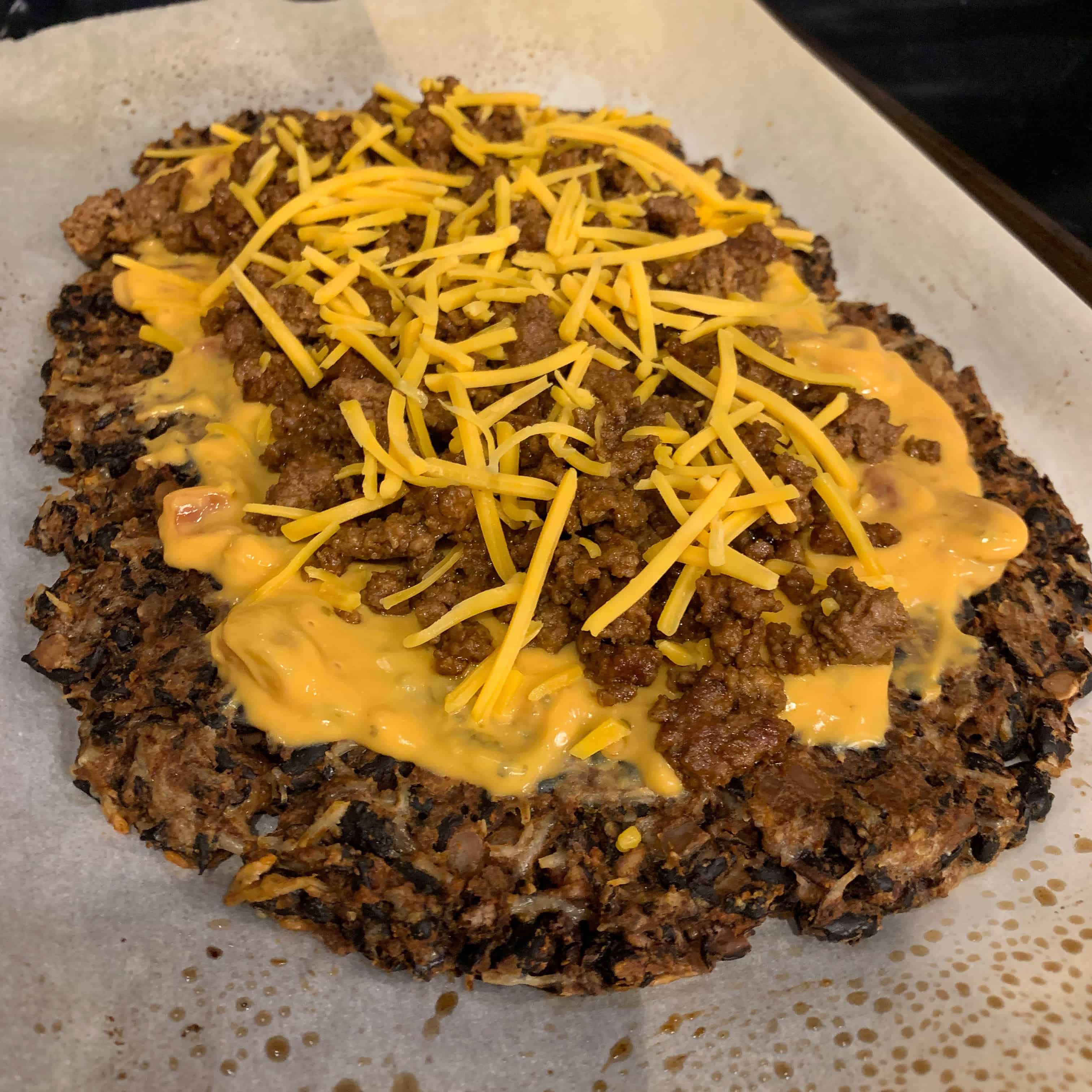 taco pizza before baking one final time