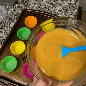 low carb pumpkin protein muffins ingredients mixed in a bowl before going in the muffin molds