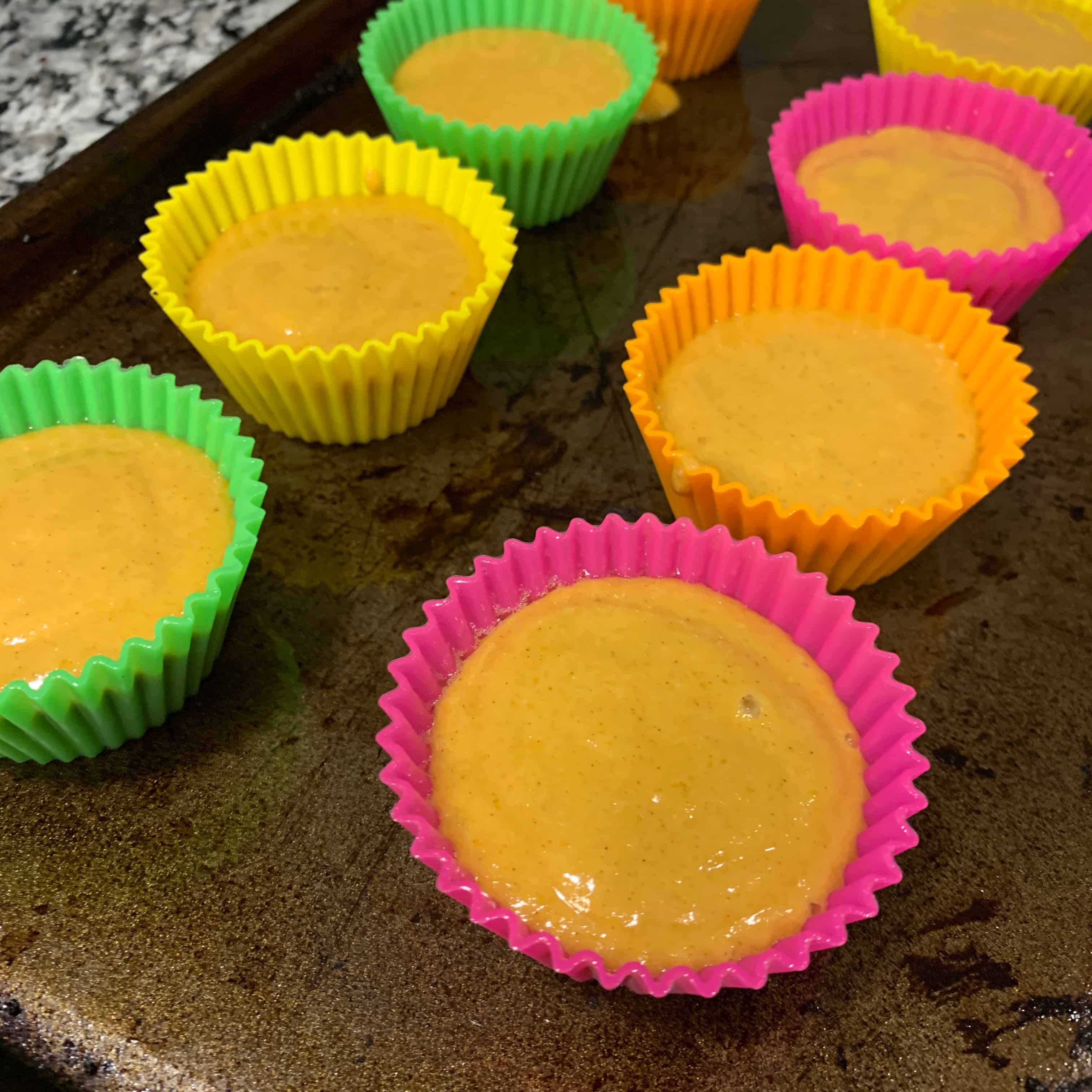 low carb pumpkin protein muffins batter in the muffin molds