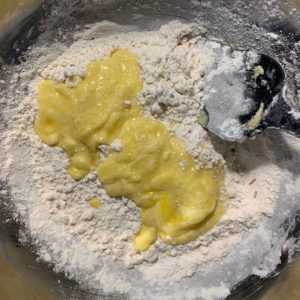 wet ingredients added to the mixed dry ingredients