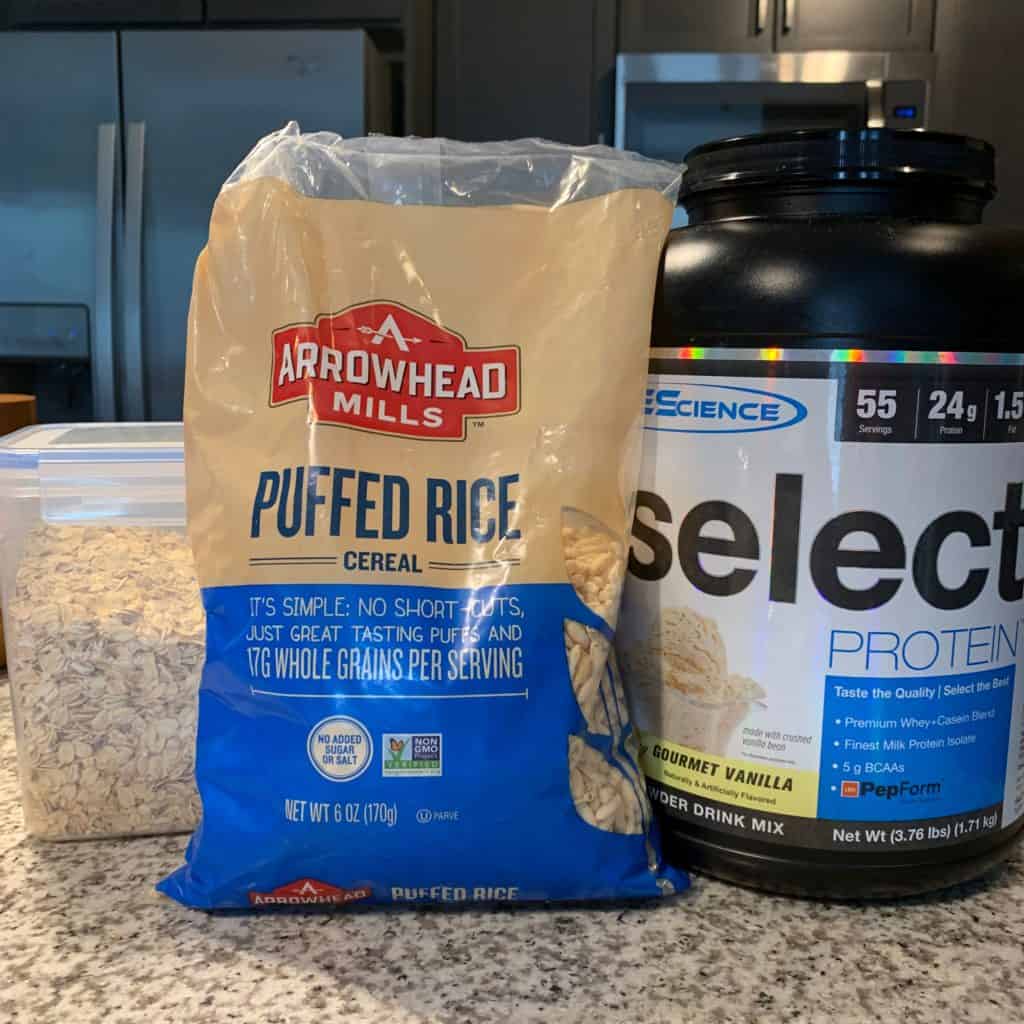 rolled oats, puffed rice cereal, and pescience protein powder for protein granola