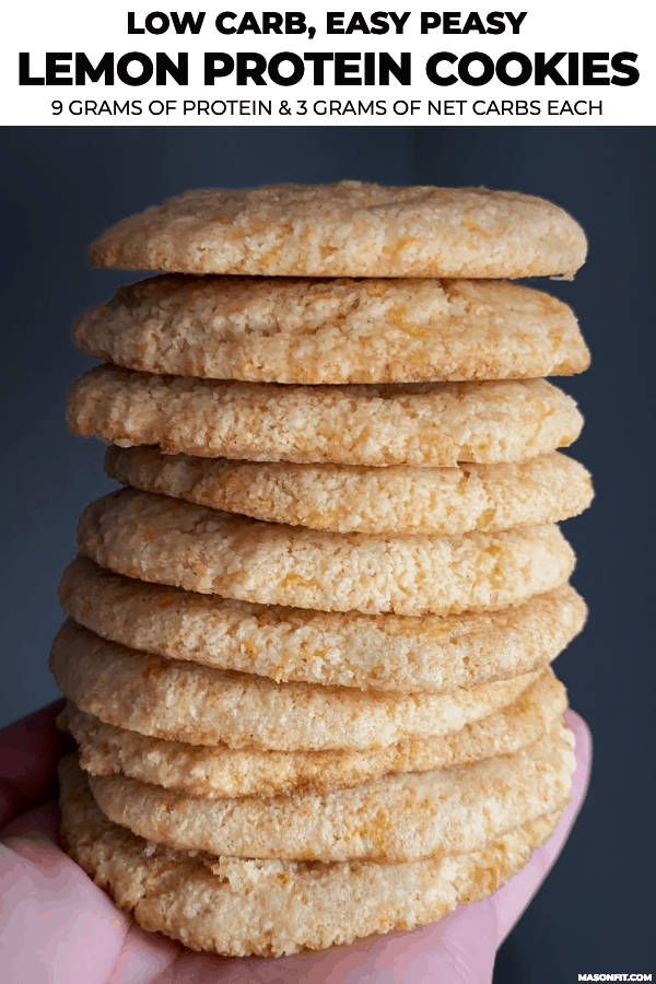 a stack of lemon protein cookies in a hand