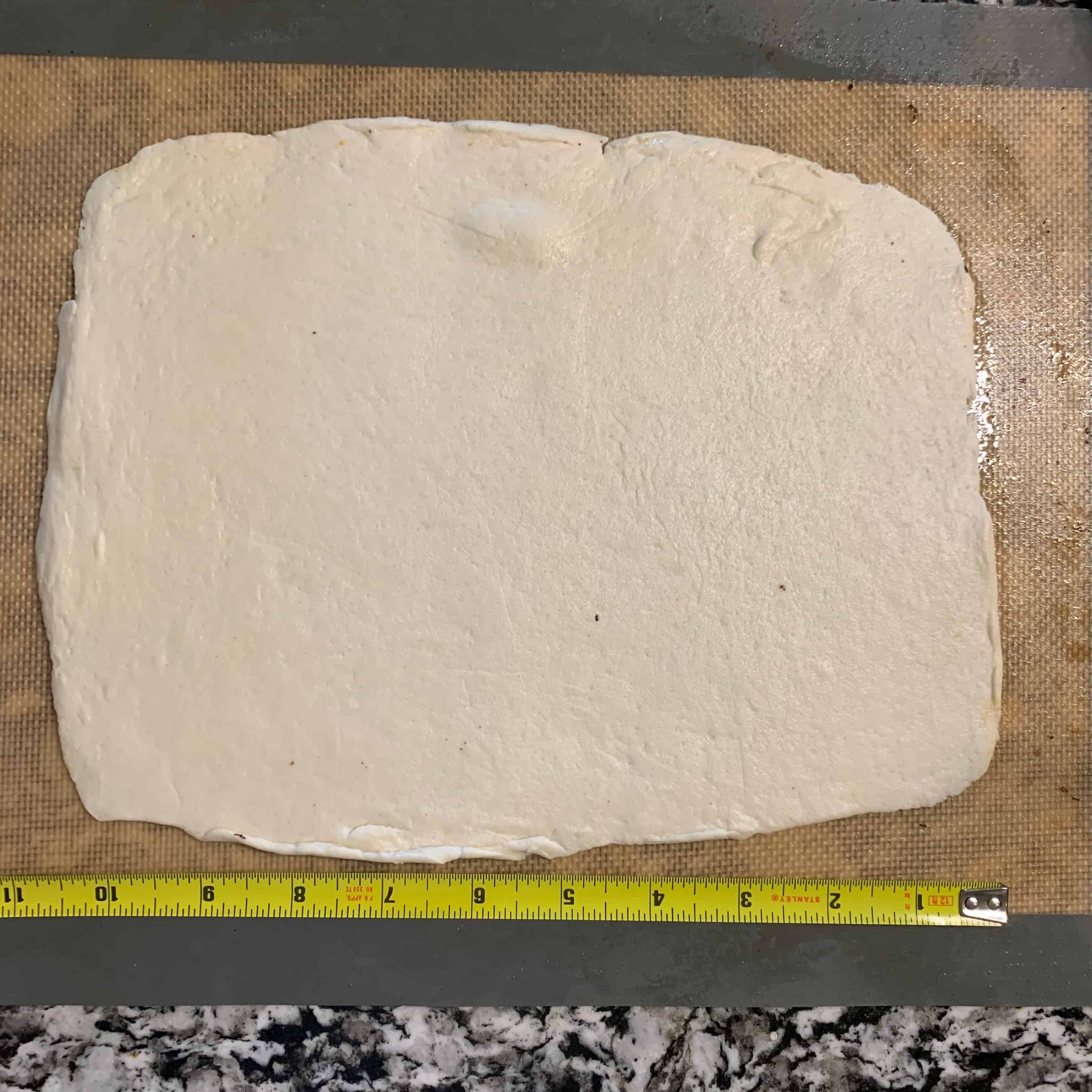 a rectangle of 2 ingredient dough before making empanadas