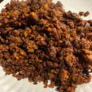sausage cooked with spices on a plate