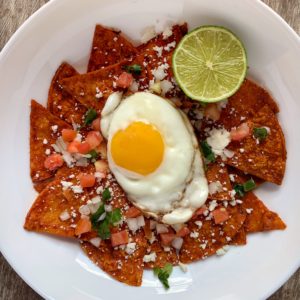 healthy chilaquiles in a white bowl