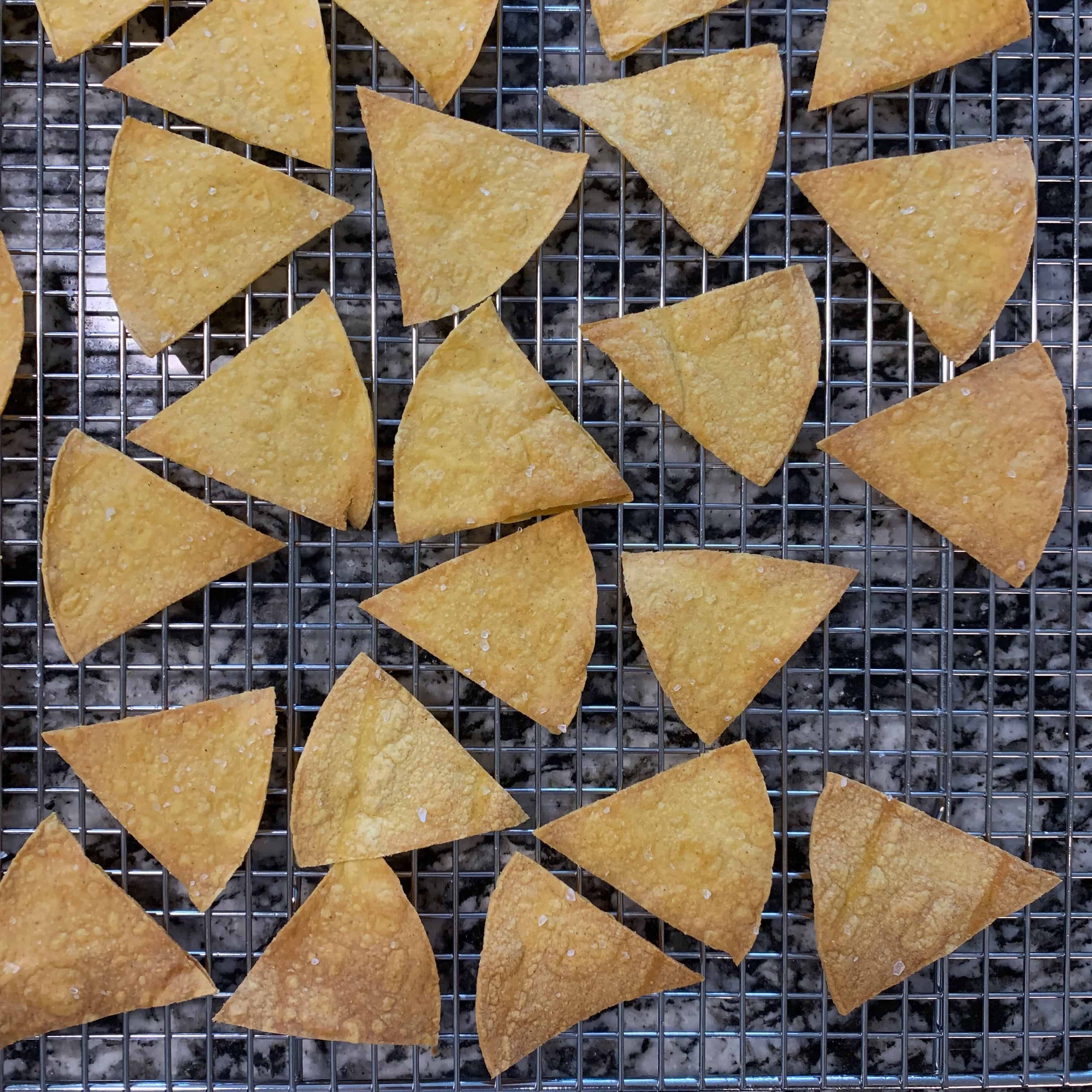 baked tortilla chips on a wire rack