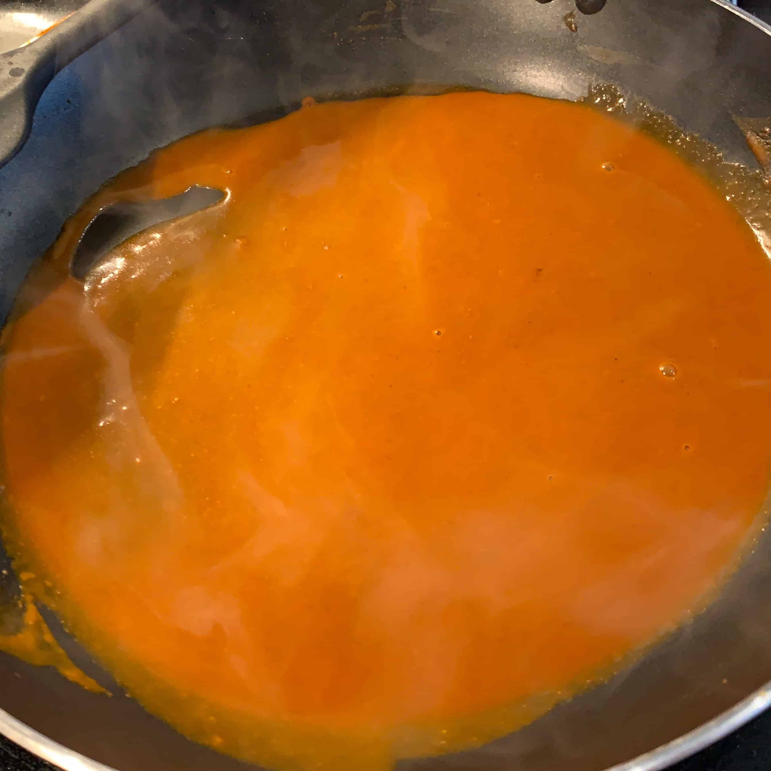 enchilada sauce in a pan