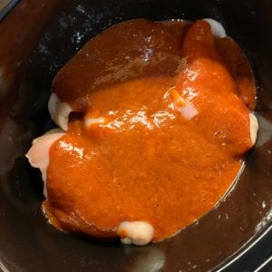 honey chipotle crockpot pulled chicken in a crockpot before cooking