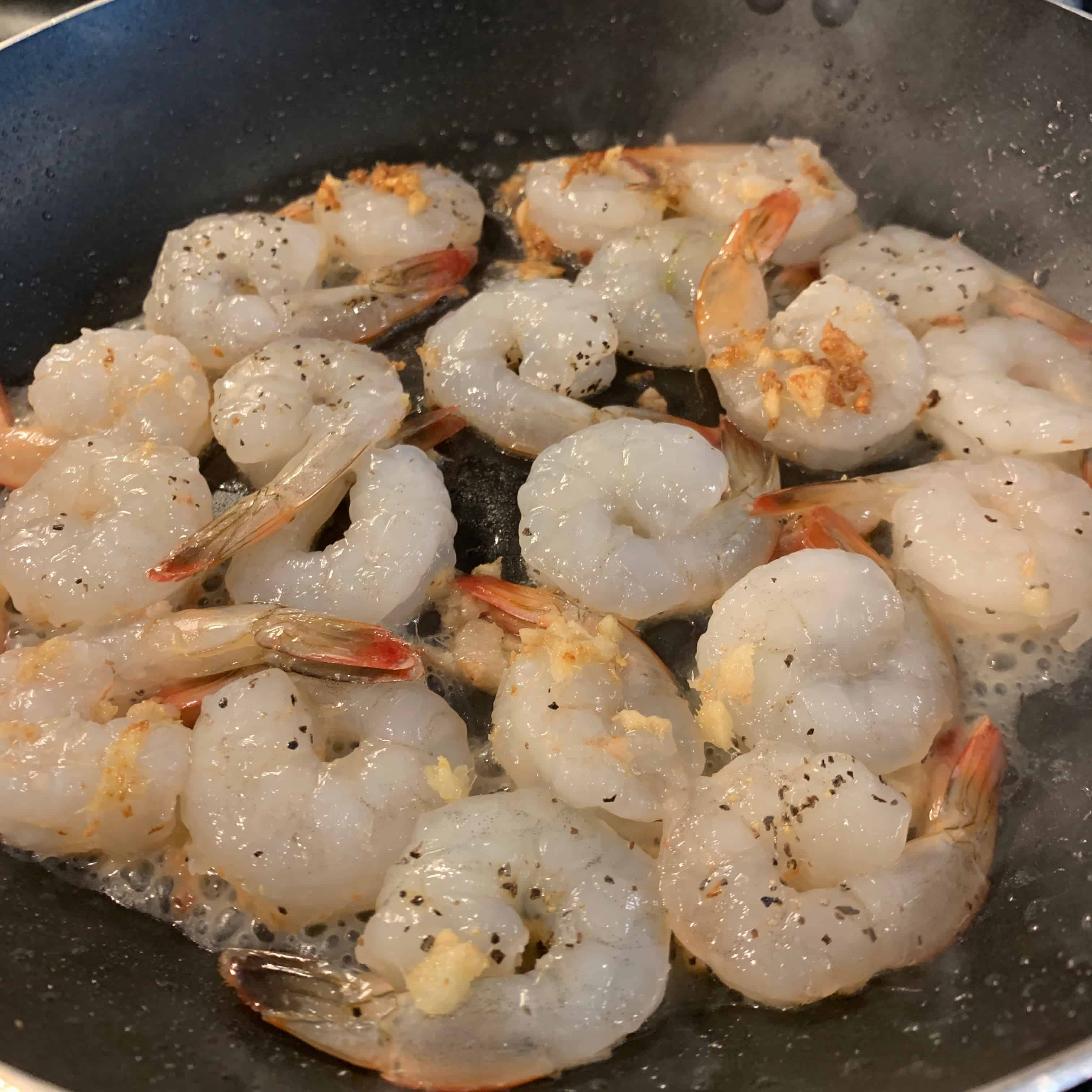 cooking shrimp with the sesame oil and ginger