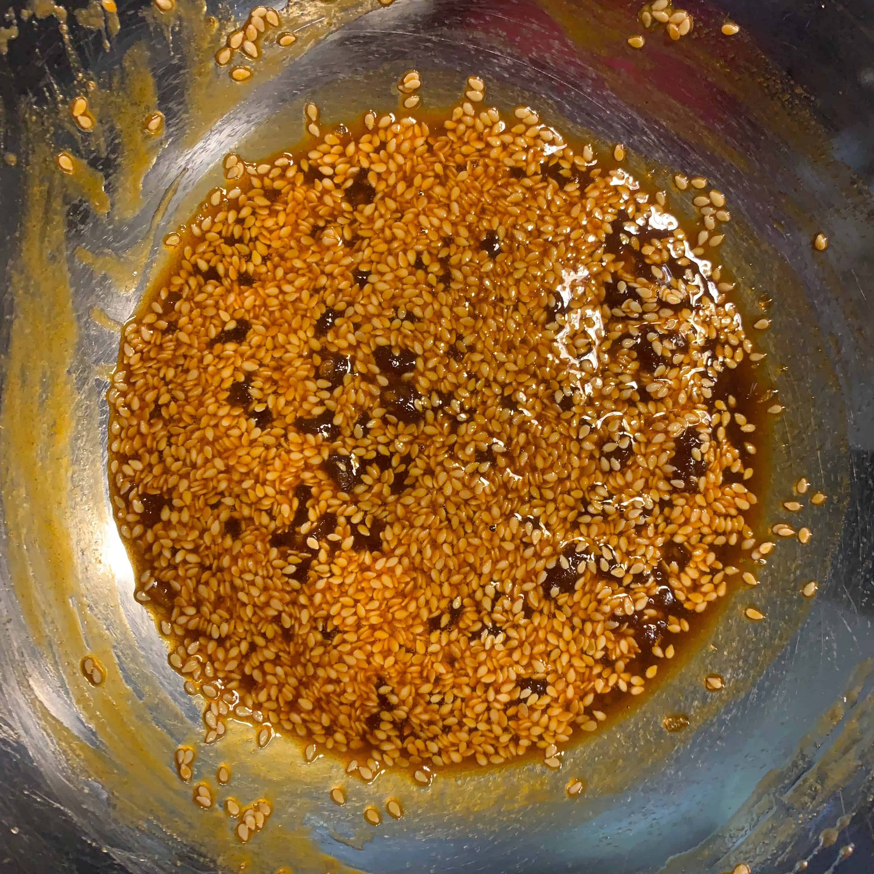 sesame seeds mixed with chili oil, honey, and brown sugar