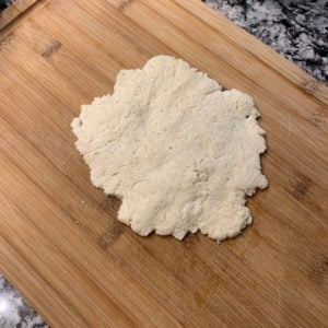 cinnamon roll in a mug dough pressed flat