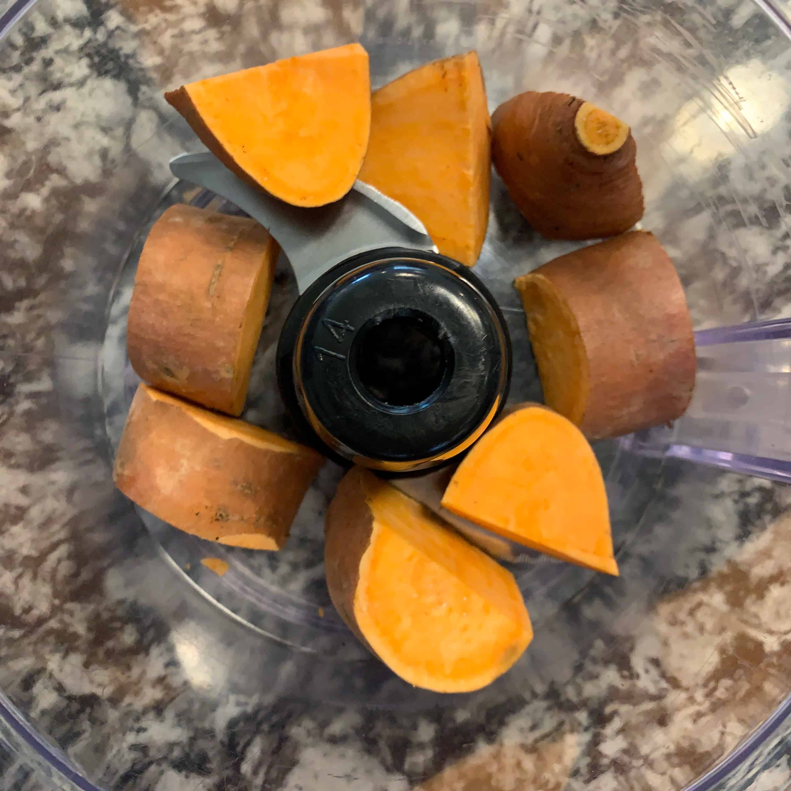 chopped sweet potato in a food processor