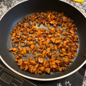 sweet potato hash browns after uncovering and flipping