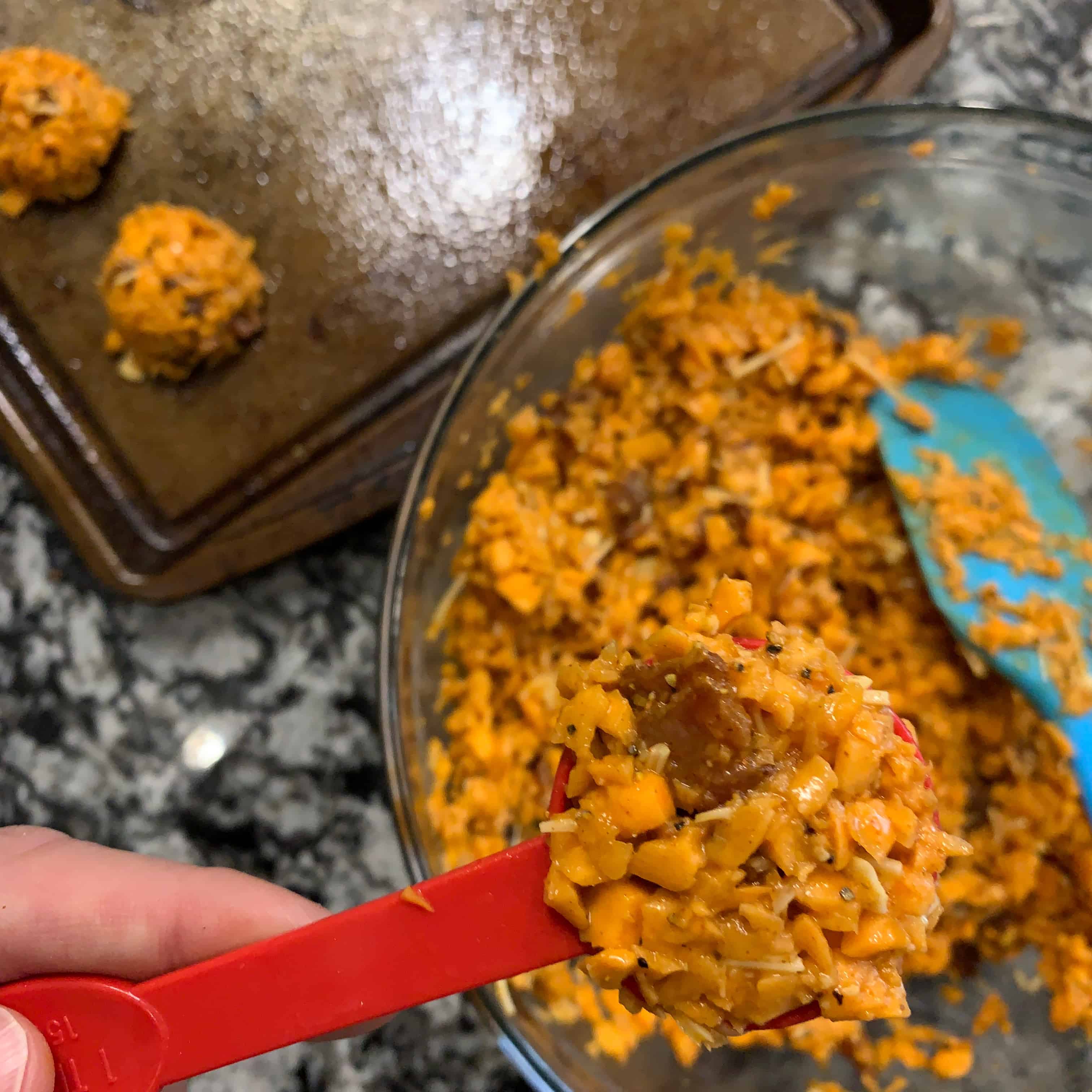sweet potato tots mixture in a tablespoon before going on the baking sheet