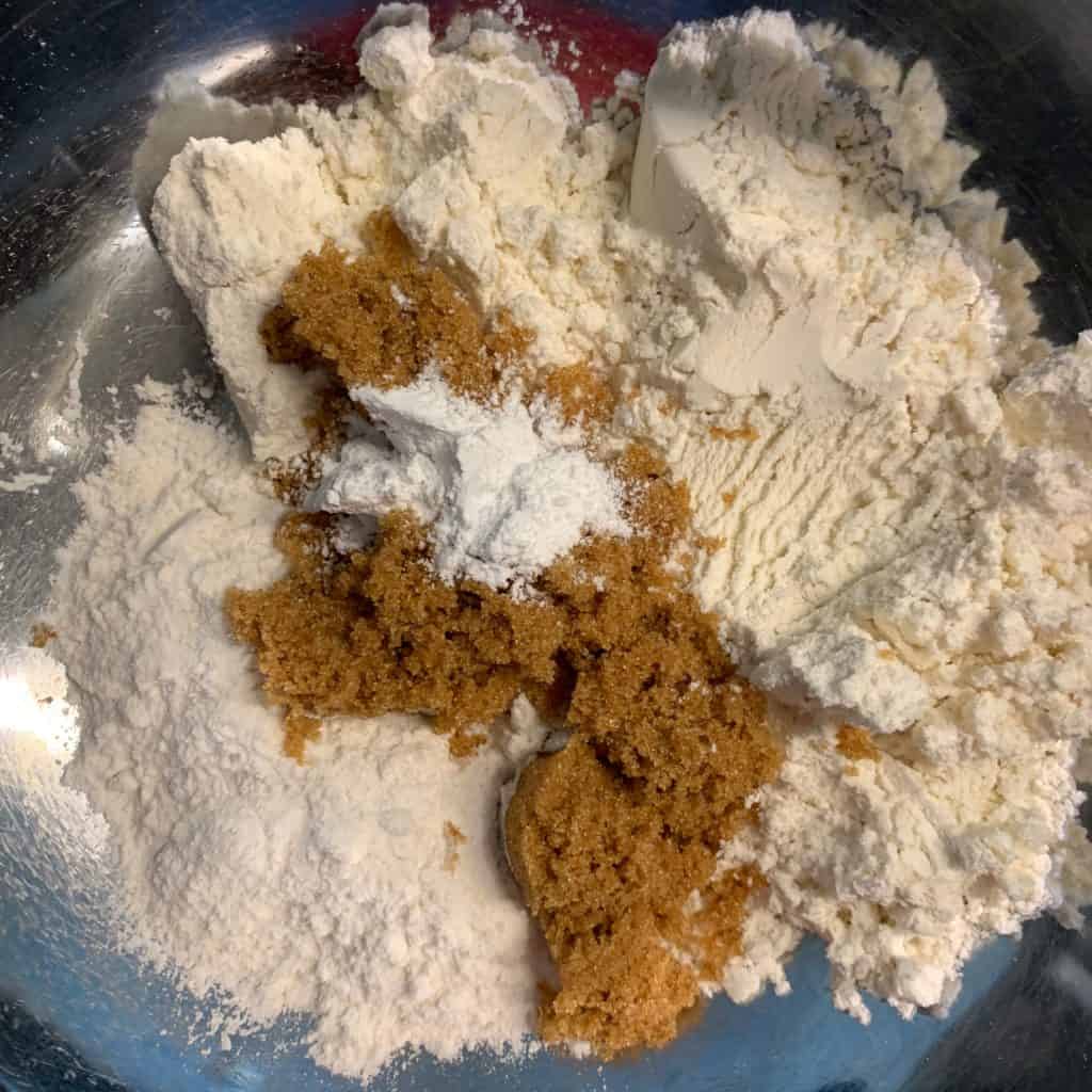 dry ingredients for peanut butter protein cookies in a mixing bowl
