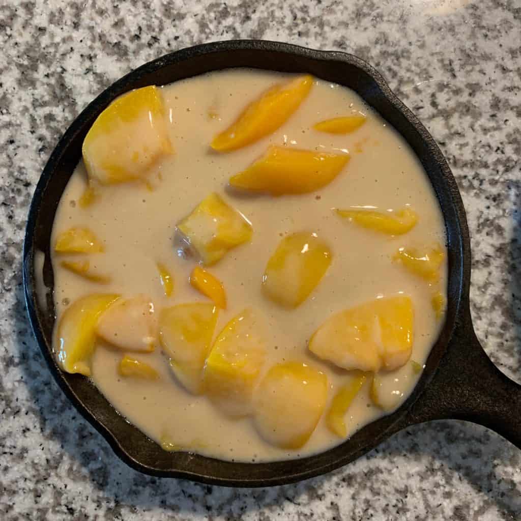 the protein peach filling in a cast iron skillet