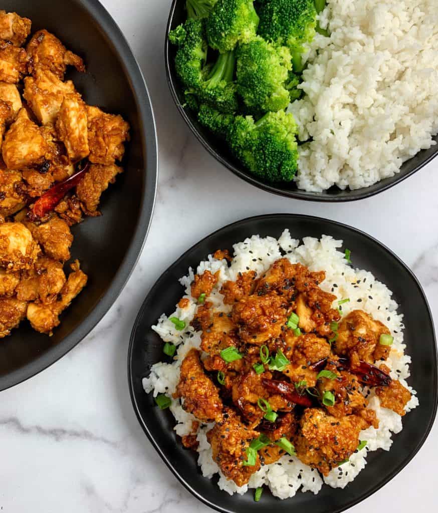 healthy general tso chicken with steamed broccoli and white rice