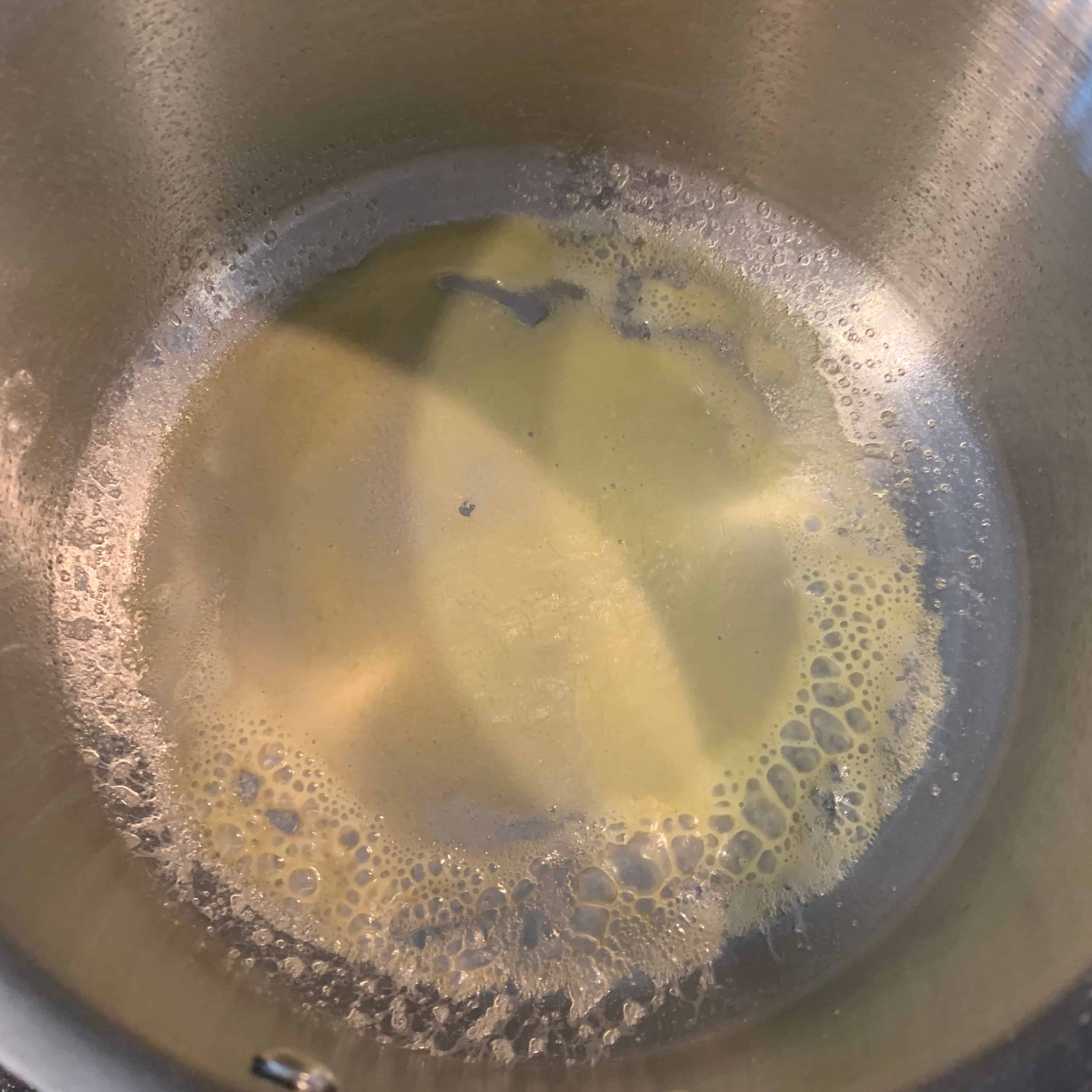 melted butter in a saucepan for gouda cheese sauce