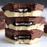 3 slutty protein brownies stacked on one another