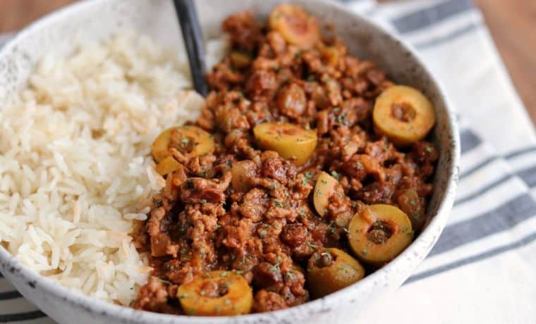 picadillo in a bowl with rice