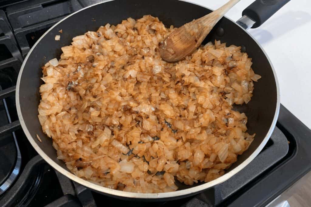 onions starting to brown after cooking in the covered pan for 10 minutes