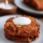 air fried buffalo tuna cake on a plate with Greek yogurt dip on top