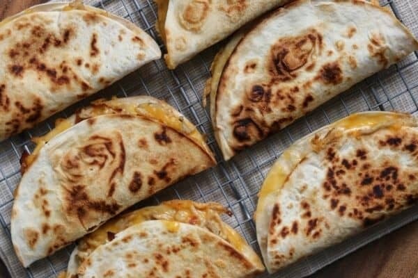 ground chicken quesadillas on a baking sheet