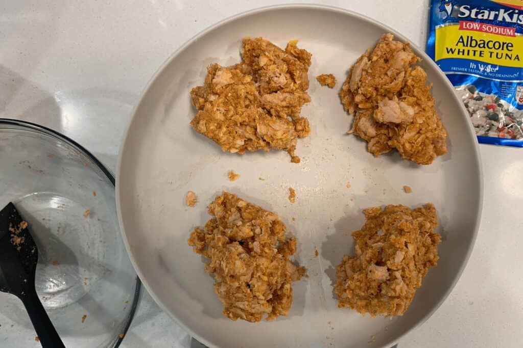 tuna cakes mixture in 4 pieces before forming and air frying