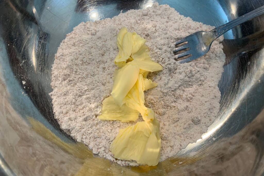 cutting butter into dry ingredients with a fork