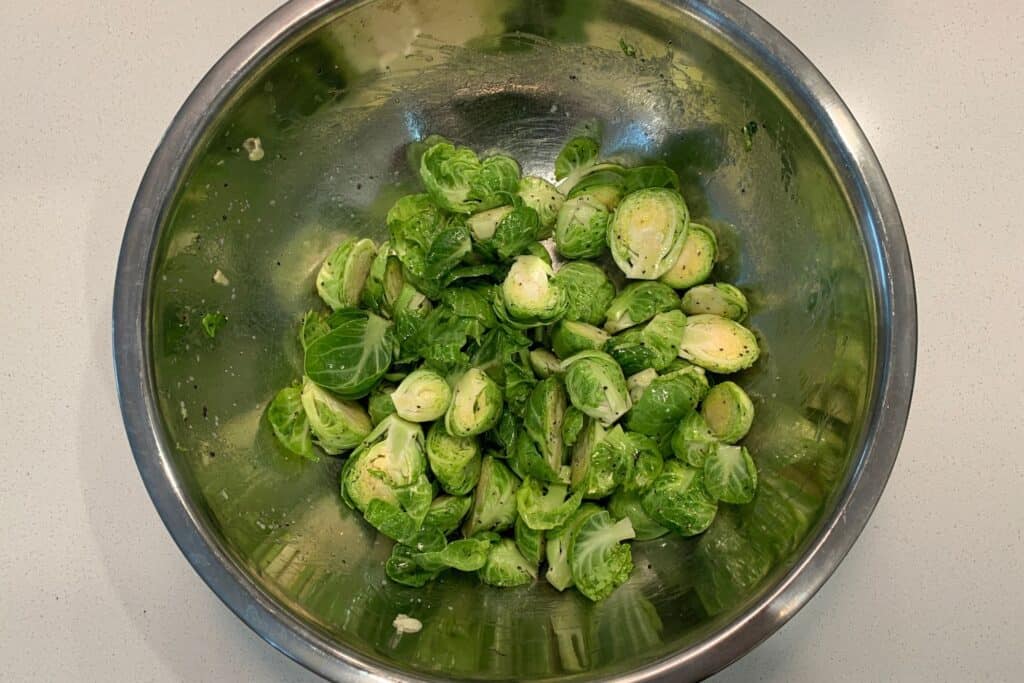 halved brussels sprouts tossed in olive oil, salt, and pepper