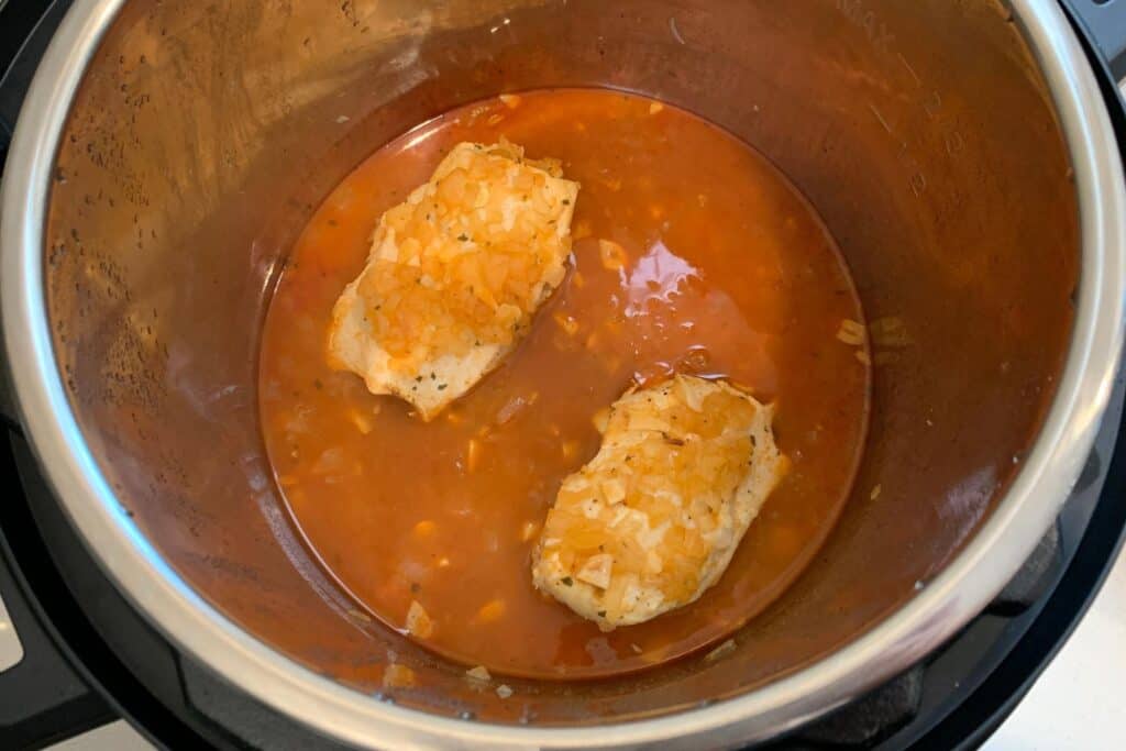 cooked buffalo chicken breast in the Instant Pot