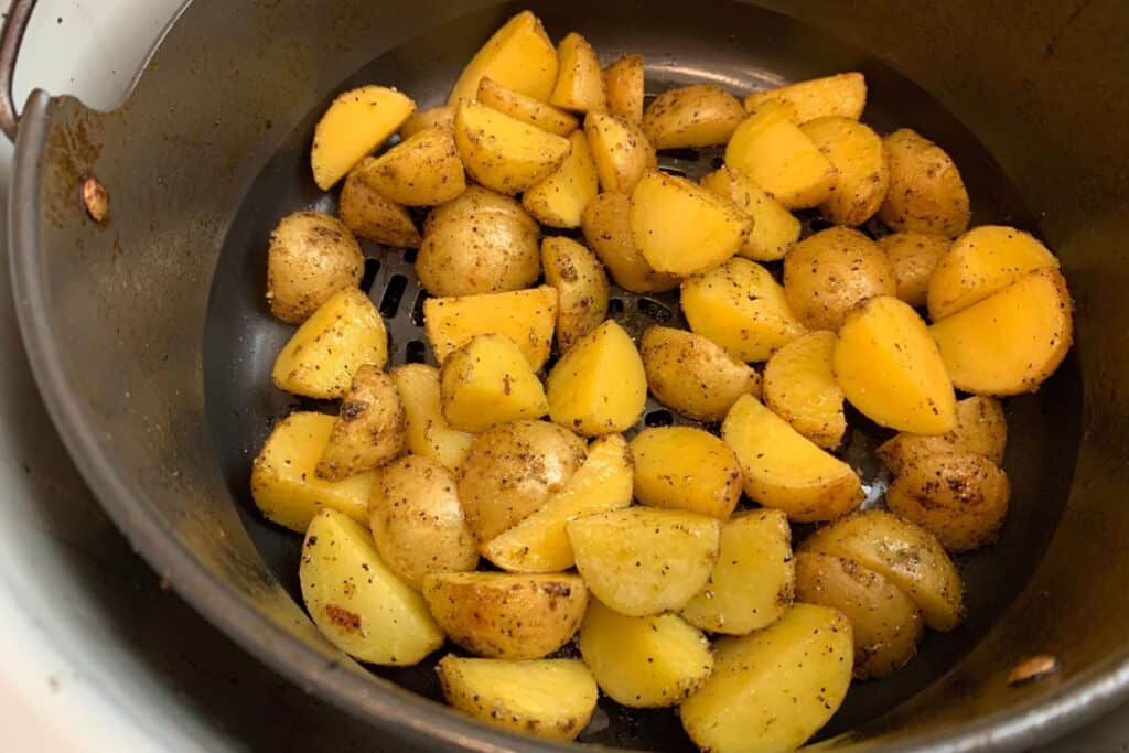 the Greek potatoes before air frying a second time