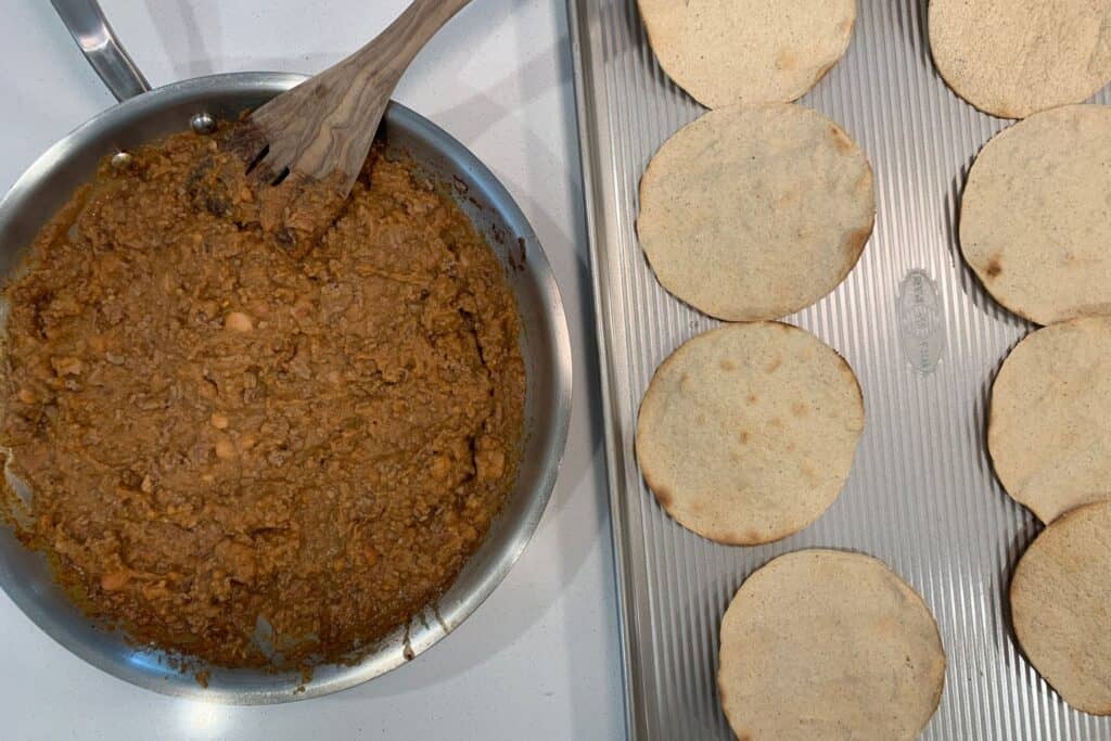 baked tostadas with ground beef and refried beans