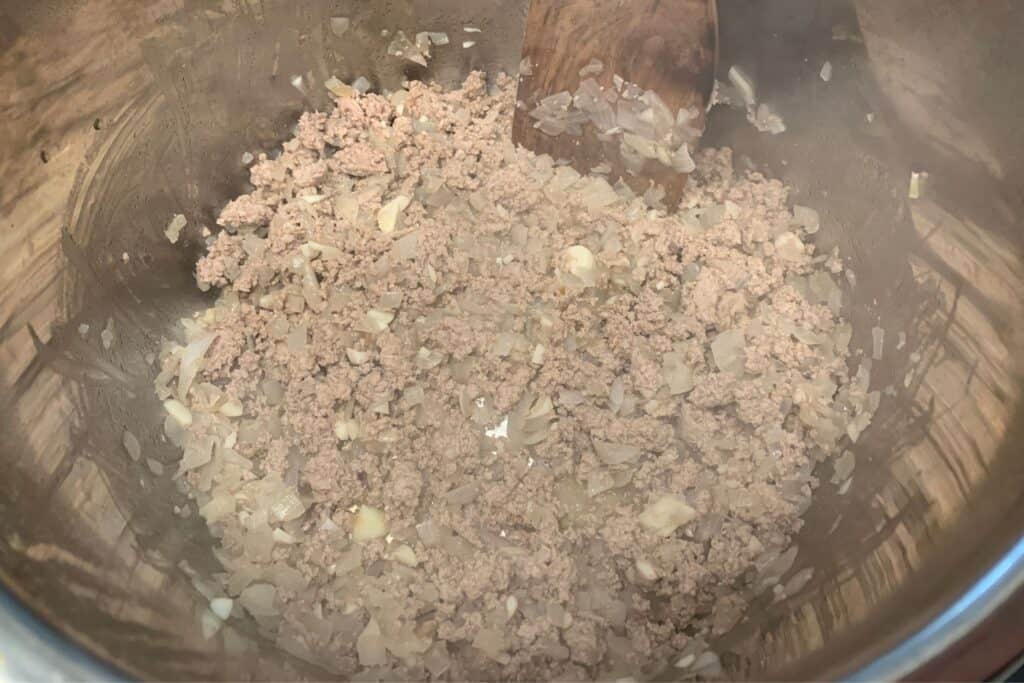 cooked ground turkey with onion and garlic in the instant pot