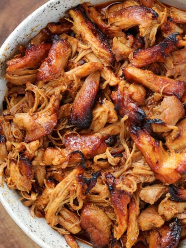 crispy pulled BBQ chicken thighs in a bowl