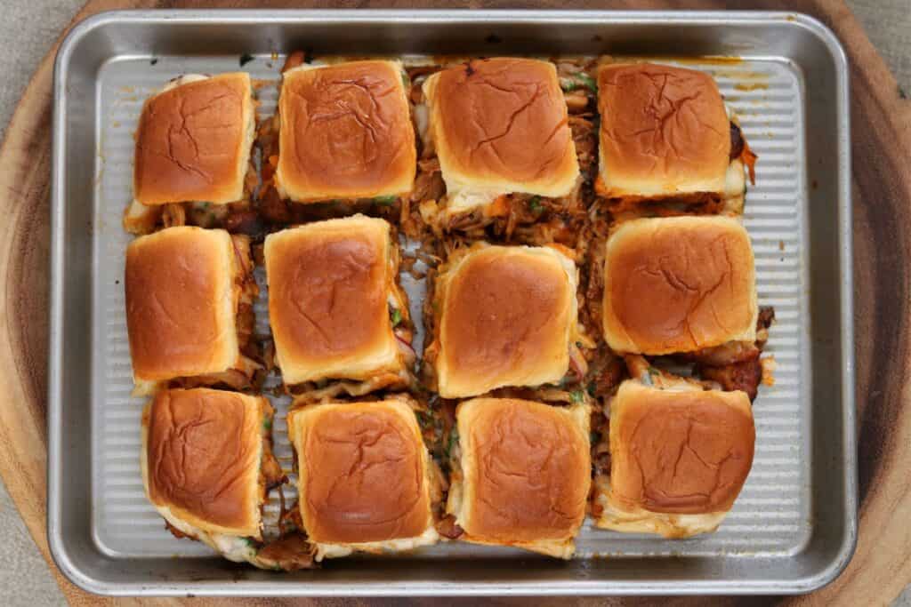 baked BBQ chicken sliders after cutting apart