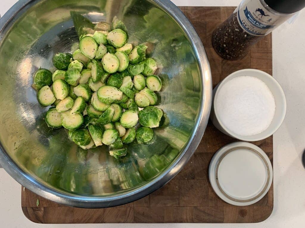 halved brussels sprouts tossed with olive oil, salt, and black pepper