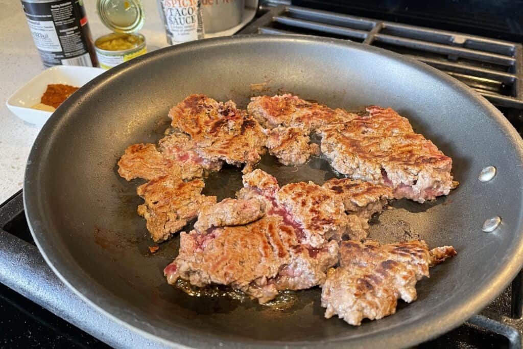 browning ground beef in a skillet
