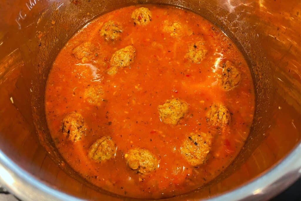 frozen turkey meatballs and risoni added to the pot before pressure cooking