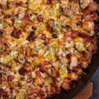 cast iron skillet with cheeseburger ground beef and radishes