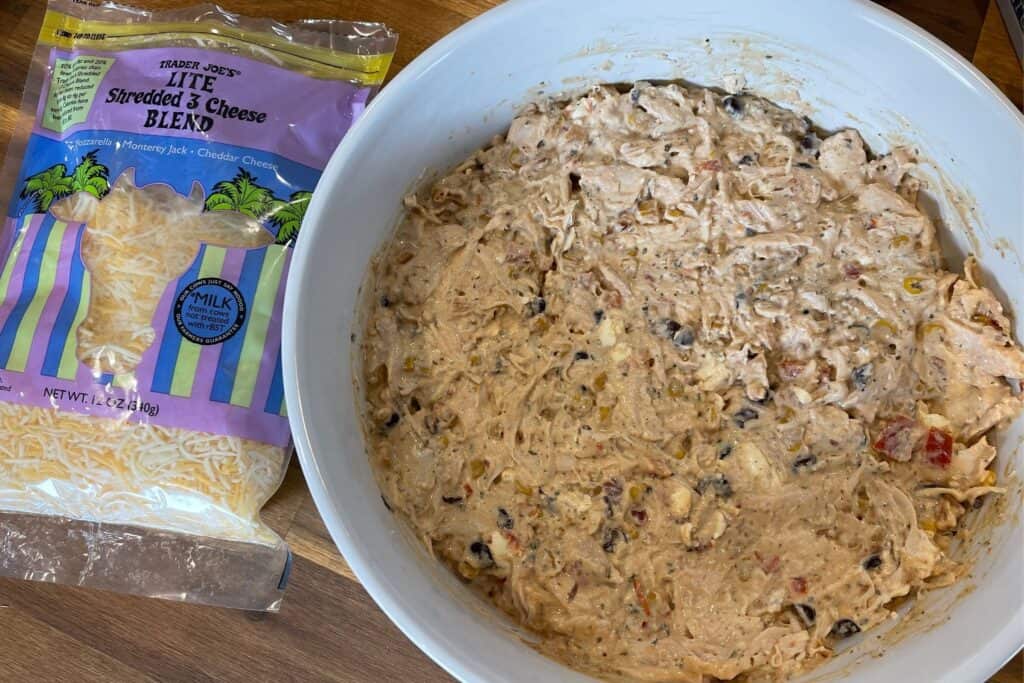 trader joe's lite shredded 3 cheese blend by the bowl of creamy chicken cowboy caviar